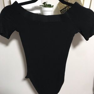 Black across the shoulder body suite